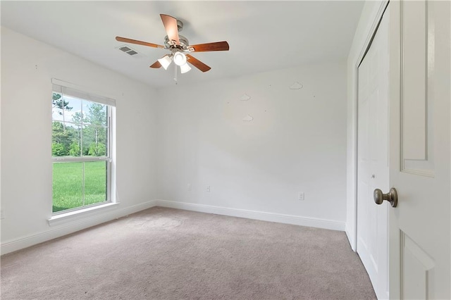 15488 Lake Ramsey Rd, Covington, LA 70435 - unfurnished room with carpet flooring, baseboards, and ceiling fan