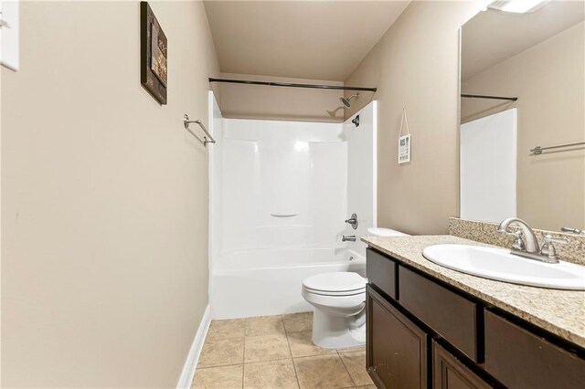 15488 Lake Ramsey Rd, Covington, LA 70435 - bathroom featuring vanity, toilet,  shower combination, tile patterned flooring, and baseboards