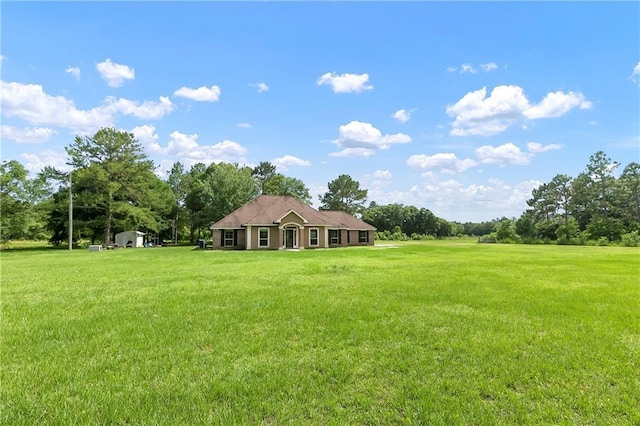 15488 Lake Ramsey Rd, Covington, LA 70435 - view of front facade with a front lawn