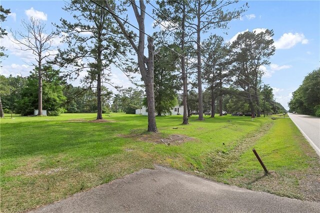 15488 Lake Ramsey Rd, Covington, LA 70435 - view of grassy yard