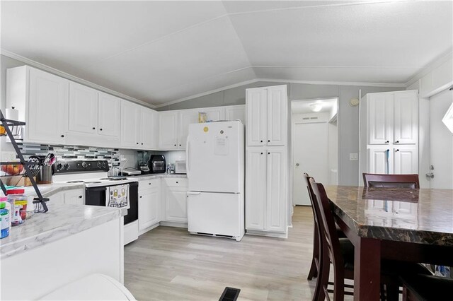15488 Lake Ramsey Rd, Covington, LA 70435 - kitchen with white appliances, lofted ceiling, light wood finished floors, white cabinetry, and light stone counters