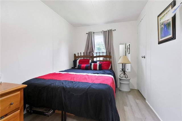 15488 Lake Ramsey Rd, Covington, LA 70435 - bedroom with wood finished floors and baseboards