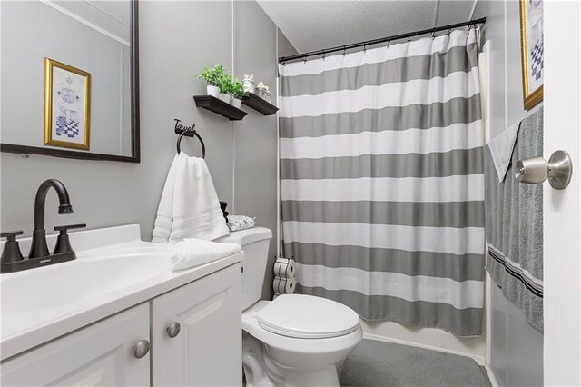 15488 Lake Ramsey Rd, Covington, LA 70435 - bathroom with toilet, vanity, a shower with shower curtain, and a textured ceiling