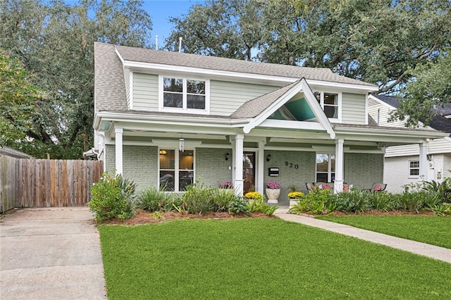 920 Bonnabel Blvd, Metairie, LA 70005 - view of front facade featuring covered porch and brick siding