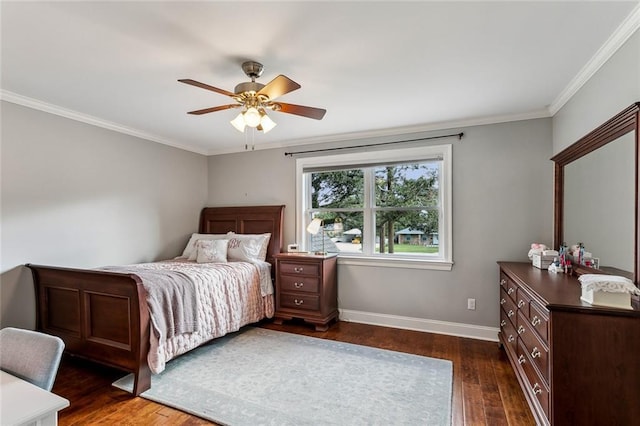920 Bonnabel Blvd, Metairie, LA 70005 - bedroom featuring dark wood-style floors, baseboards, crown molding, and a ceiling fan