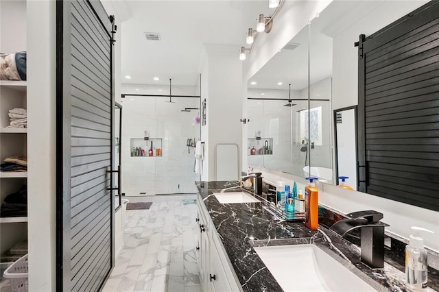 67 W Claiborne Sq, Chalmette, LA 70043 - full bath featuring marble finish flooring, a closet, a stall shower, double vanity, and recessed lighting