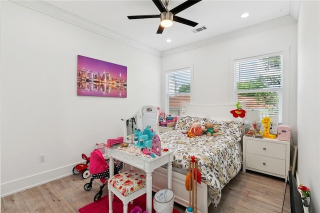 67 W Claiborne Sq, Chalmette, LA 70043 - bedroom featuring crown molding, light wood-style flooring, baseboards, ceiling fan, and recessed lighting