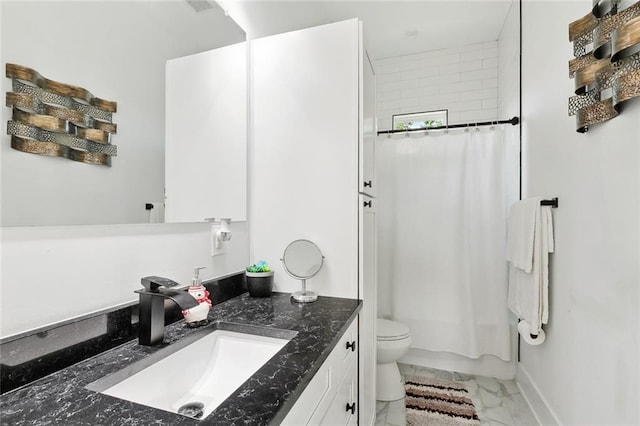 67 W Claiborne Sq, Chalmette, LA 70043 - full bathroom with marble look tile flooring, vanity, toilet, baseboards, and shower / tub combo