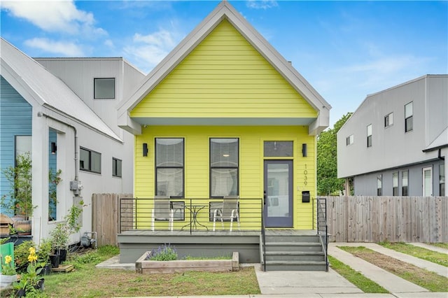 1039 Verret St, New Orleans, LA 70114 - shotgun-style home featuring covered porch