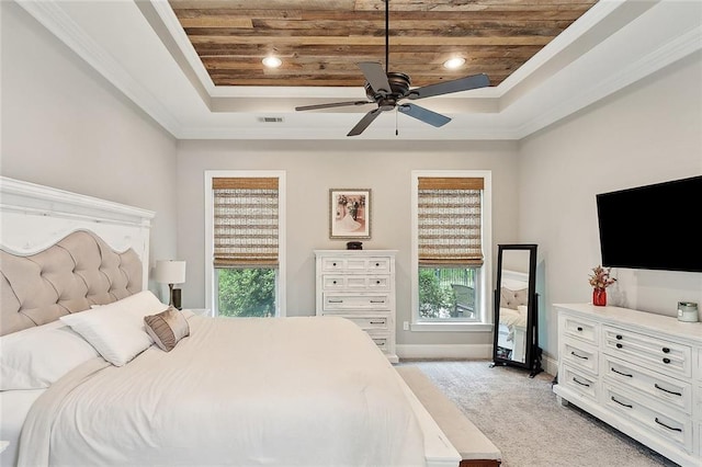 596 Blue Heron Ln, Madisonville, LA 70447 - bedroom with wood ceiling, a raised ceiling, light colored carpet, baseboards, and crown molding