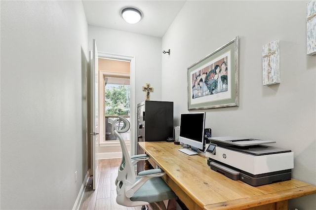 596 Blue Heron Ln, Madisonville, LA 70447 - office featuring baseboards and wood finished floors