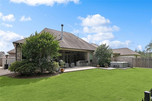 596 Blue Heron Ln, Madisonville, LA 70447 - rear view of property featuring a hot tub, a patio, brick siding, and cooling unit