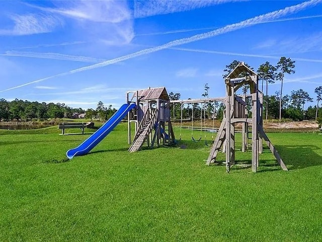 596 Blue Heron Ln, Madisonville, LA 70447 - community playground with a yard