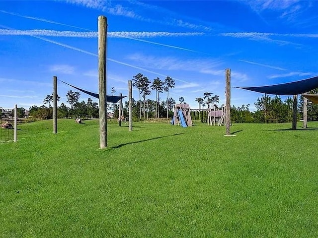 596 Blue Heron Ln, Madisonville, LA 70447 - view of grassy yard