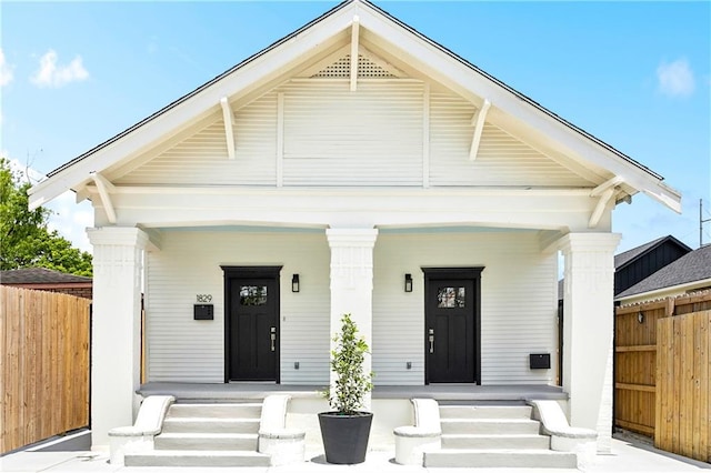 1827-29 Frenchmen St, New Orleans, LA 70116 - view of front of home featuring a porch