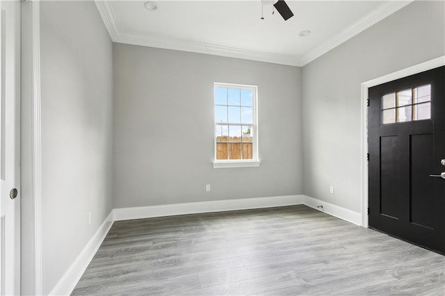 1827-29 Frenchmen St, New Orleans, LA 70116 - entrance foyer featuring a ceiling fan, crown molding, baseboards, and wood finished floors