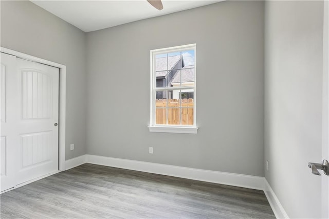 1827-29 Frenchmen St, New Orleans, LA 70116 - unfurnished bedroom with wood finished floors, baseboards, and a closet