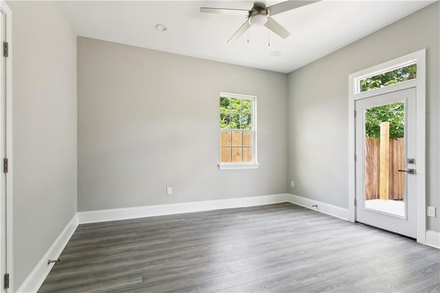 1827-29 Frenchmen St, New Orleans, LA 70116 - unfurnished room featuring wood finished floors, ceiling fan, and baseboards