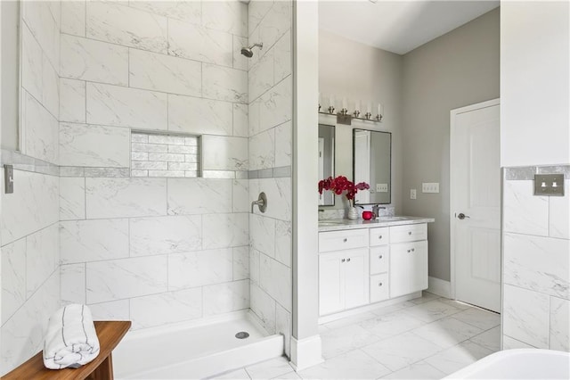1827-29 Frenchmen St, New Orleans, LA 70116 - bathroom with vanity, a tile shower, and marble look tile flooring
