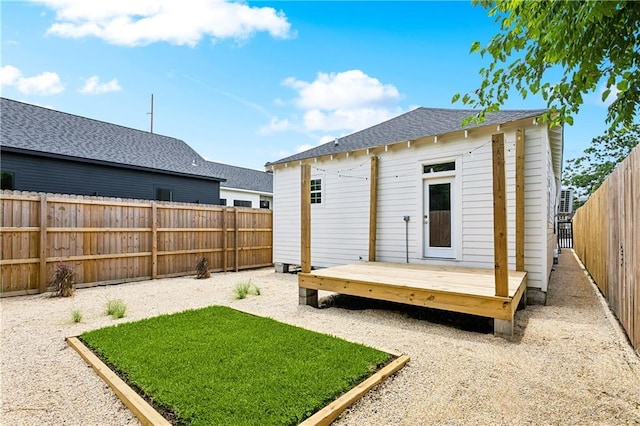 1827-29 Frenchmen St, New Orleans, LA 70116 - rear view of property featuring a wooden deck and a shingled roof