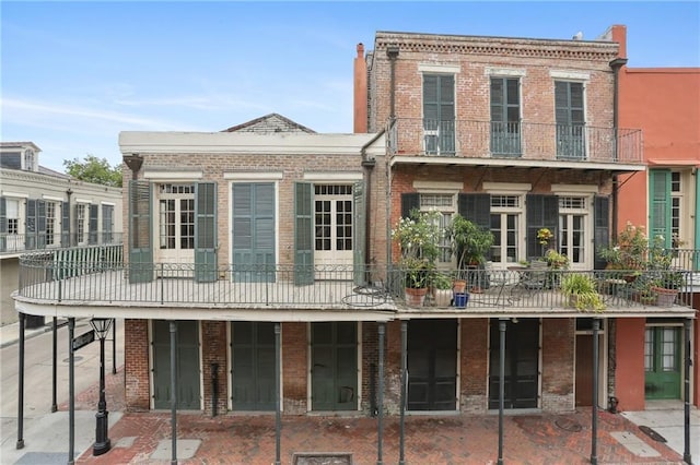 1138-1140 Chartres St, New Orleans, LA 70116 - back of property featuring brick siding