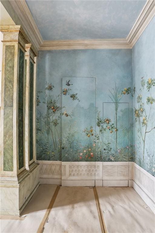 1138-1140 Chartres St, New Orleans, LA 70116 - spare room with crown molding, wallpapered walls, and a wainscoted wall