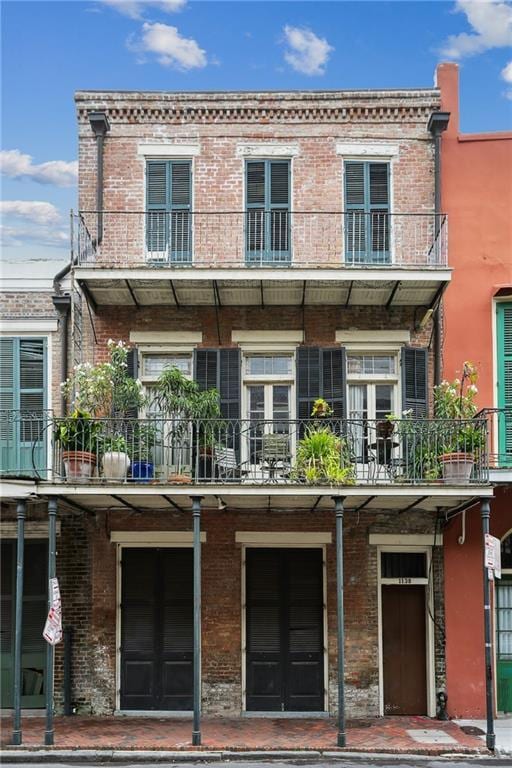 1138-1140 Chartres St, New Orleans, LA 70116 - back of property featuring brick siding