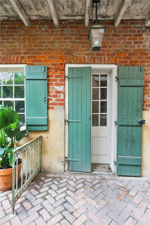 1138-1140 Chartres St, New Orleans, LA 70116 - property entrance featuring brick siding