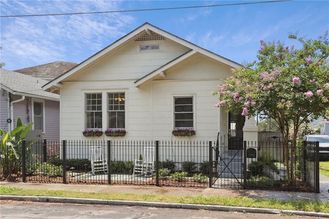 4198 Dumaine St, New Orleans, LA 70119 - bungalow-style house with a fenced front yard