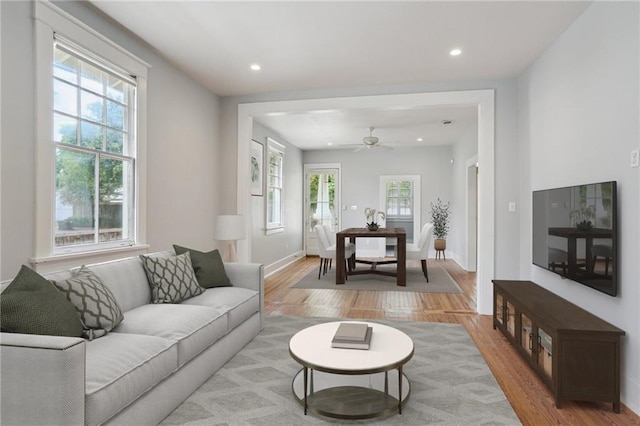 4198 Dumaine St, New Orleans, LA 70119 - living room featuring light wood-type flooring, a ceiling fan, and recessed lighting