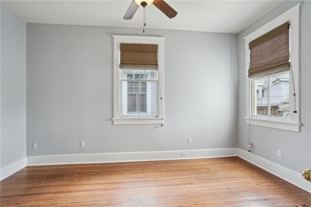 4198 Dumaine St, New Orleans, LA 70119 - spare room with plenty of natural light, light wood finished floors, a ceiling fan, and baseboards