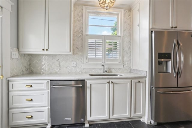 4198 Dumaine St, New Orleans, LA 70119 - kitchen featuring stainless steel appliances, light countertops, and white cabinetry