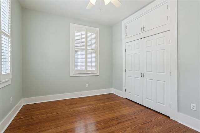4198 Dumaine St, New Orleans, LA 70119 - unfurnished bedroom featuring wood finished floors, a closet, and ceiling fan