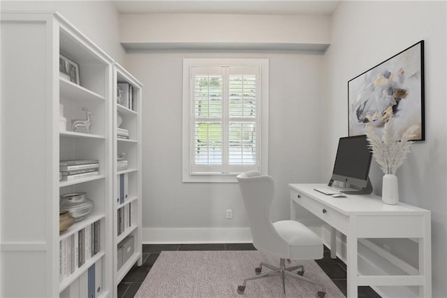 4198 Dumaine St, New Orleans, LA 70119 - home office with baseboards and dark tile patterned flooring