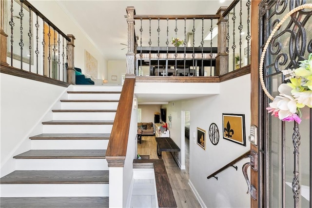 3740 Lake Lynn Dr, Gretna, LA 70056 - stairway with wood finished floors and baseboards