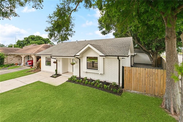 2024 Manson Ave, Metairie, LA 70001 - single story home with roof with shingles, driveway, and brick siding