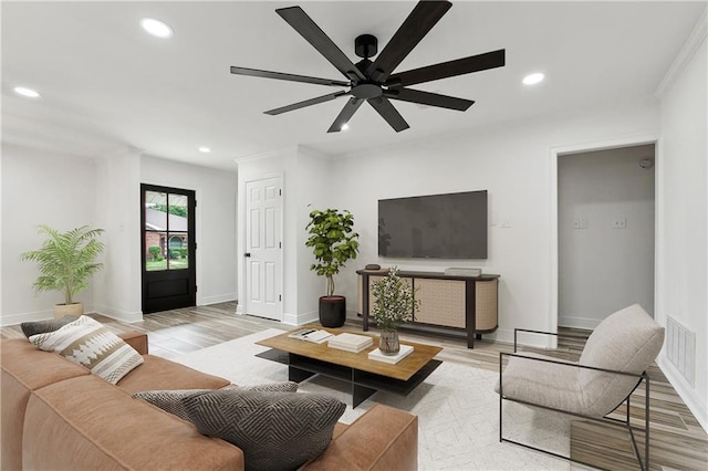 2024 Manson Ave, Metairie, LA 70001 - living area featuring recessed lighting, light wood-style floors, ceiling fan, and baseboards