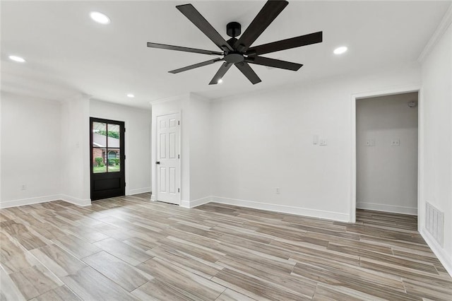 2024 Manson Ave, Metairie, LA 70001 - spare room featuring a ceiling fan, light wood finished floors, recessed lighting, and baseboards