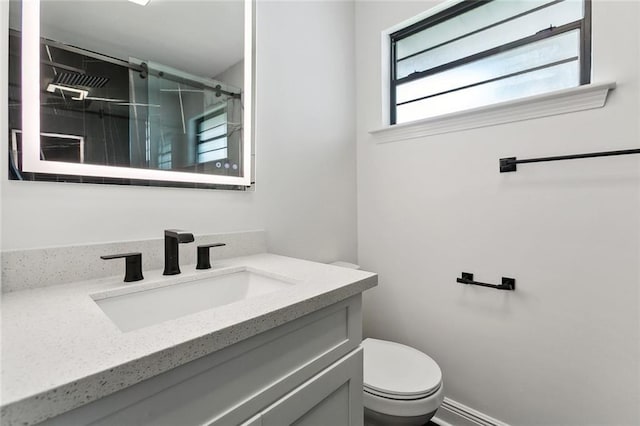 2024 Manson Ave, Metairie, LA 70001 - full bathroom featuring a shower stall, vanity, and toilet