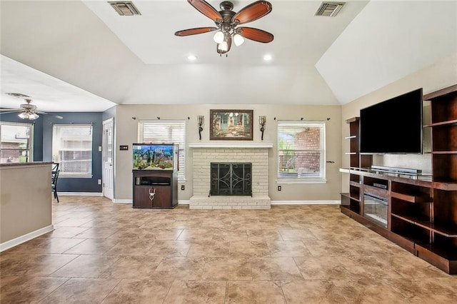 255 Wilson Ln, Belle Chasse, LA 70037 - living area featuring a ceiling fan, baseboards, lofted ceiling, and a brick fireplace