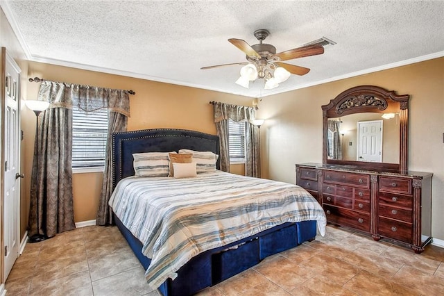 255 Wilson Ln, Belle Chasse, LA 70037 - bedroom featuring ornamental molding, a textured ceiling, a ceiling fan, and baseboards