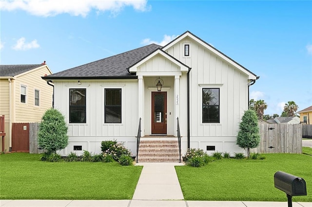 2535 Athis St, New Orleans, LA 70122 - modern farmhouse featuring crawl space, board and batten siding, and a shingled roof