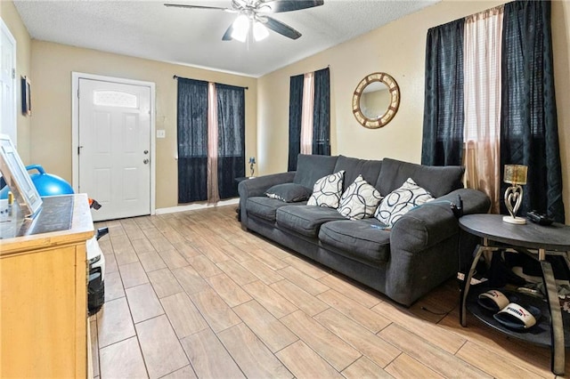 1656 Buccola Ave, Marrero, LA 70072 - living room featuring ceiling fan, wood finish floors, and a textured ceiling