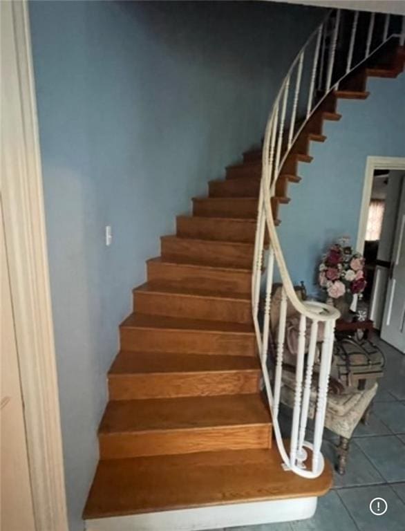 3867 N Teak Ave, New Orleans, LA 70131 - stairway featuring tile patterned flooring