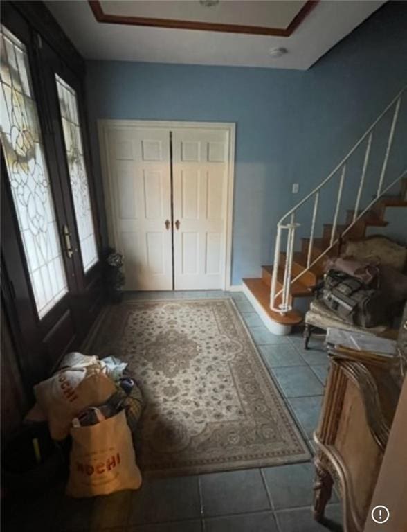 3867 N Teak Ave, New Orleans, LA 70131 - tiled foyer with healthy amount of natural light, stairs, and a tray ceiling