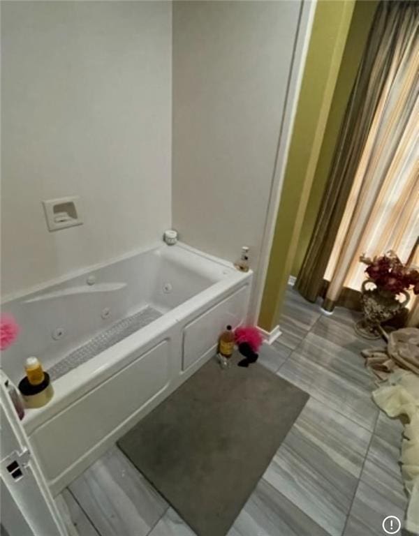 3867 N Teak Ave, New Orleans, LA 70131 - bathroom featuring a tub with jets