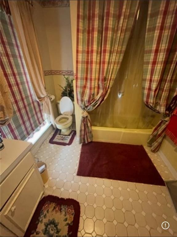 3867 N Teak Ave, New Orleans, LA 70131 - full bath with curtained shower, toilet, vanity, and tile patterned floors