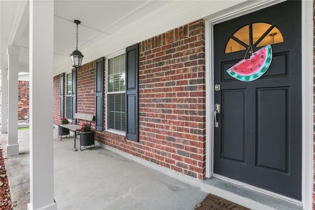 1113 Linwood Ave, Metairie, LA 70003 - entrance to property with covered porch and brick siding