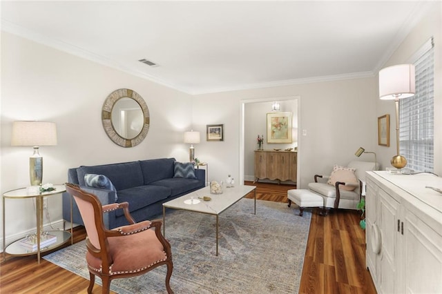 1113 Linwood Ave, Metairie, LA 70003 - living area with crown molding, wood finished floors, and baseboards