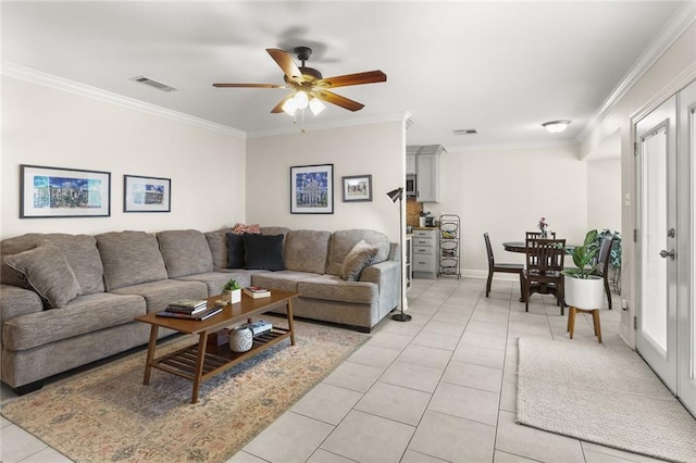 1113 Linwood Ave, Metairie, LA 70003 - living area with ornamental molding, a ceiling fan, light tile patterned floors, and baseboards